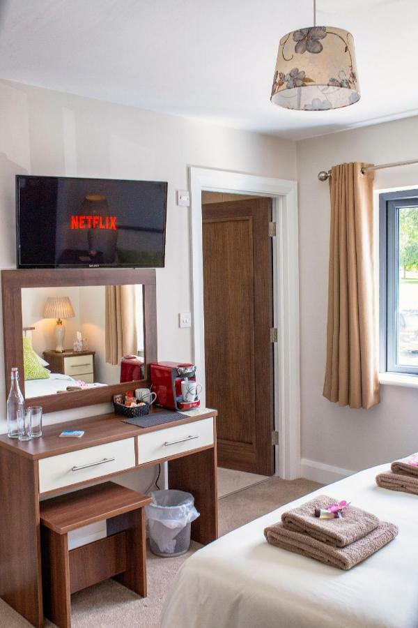 Taim Lodge Westport Esterno foto