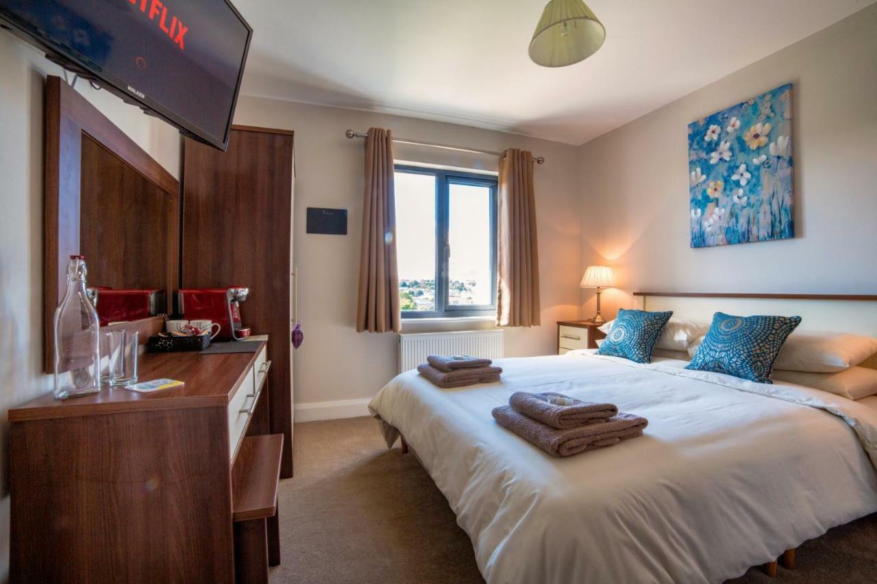 Taim Lodge Westport Esterno foto
